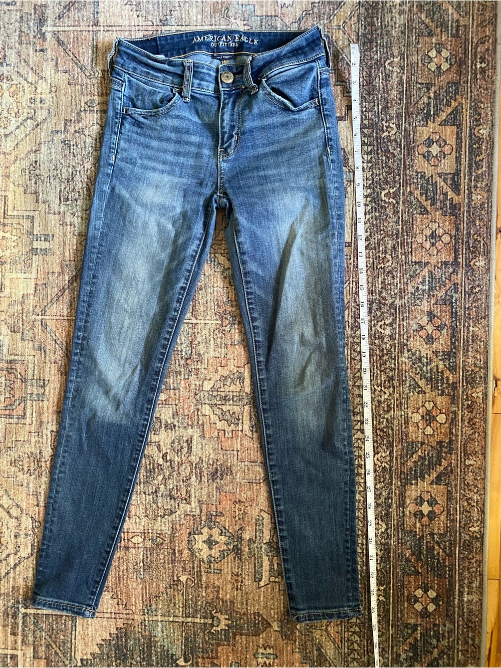 American Eagle Women's Mid-Rise Skinny Jeans in Faded Blue
